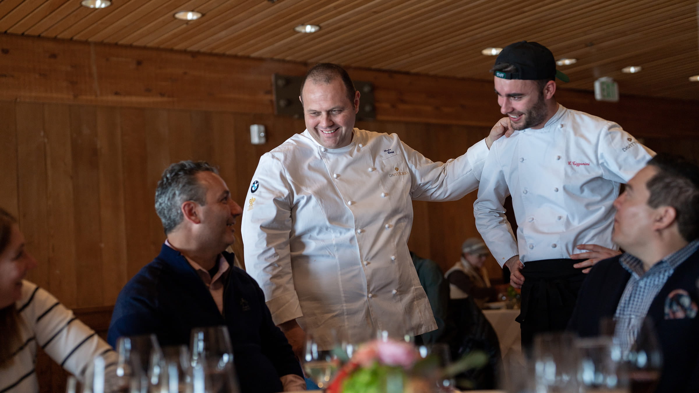 Chef Roberto Cerea talking with guests at the Taste of Luxury event.